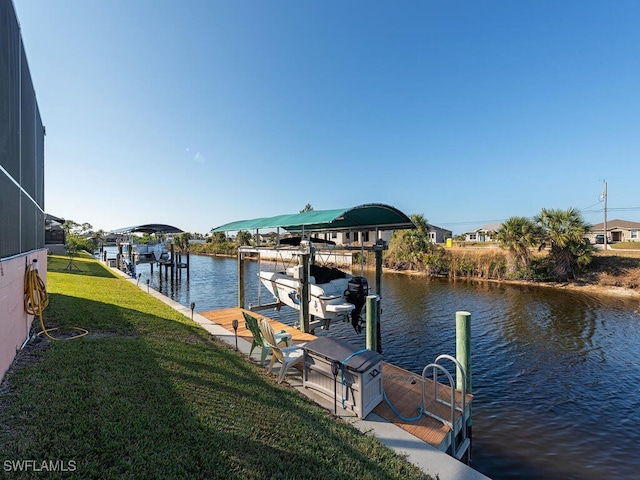 view of dock featuring a water view, a yard, and glass enclosure