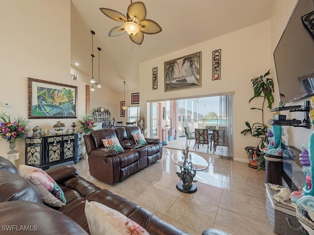 living room featuring light tile patterned floors, high vaulted ceiling, and ceiling fan