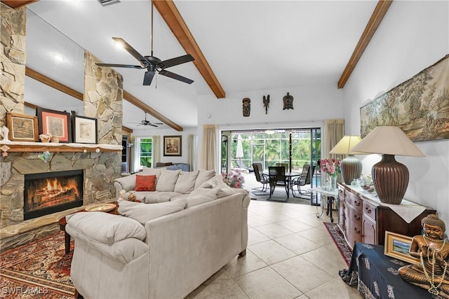 tiled living room with beamed ceiling and a fireplace