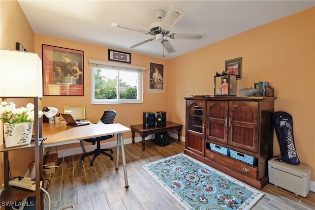 home office featuring ceiling fan and light wood-type flooring