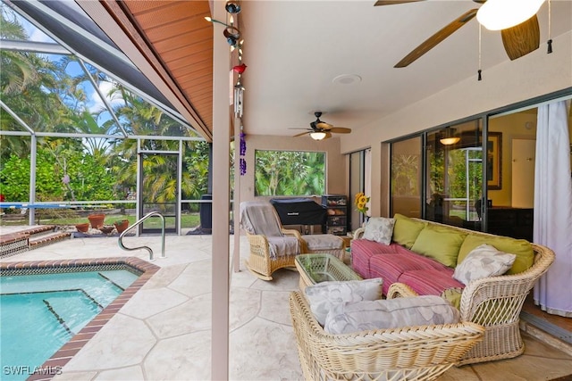 view of patio with glass enclosure, an outdoor hangout area, and ceiling fan