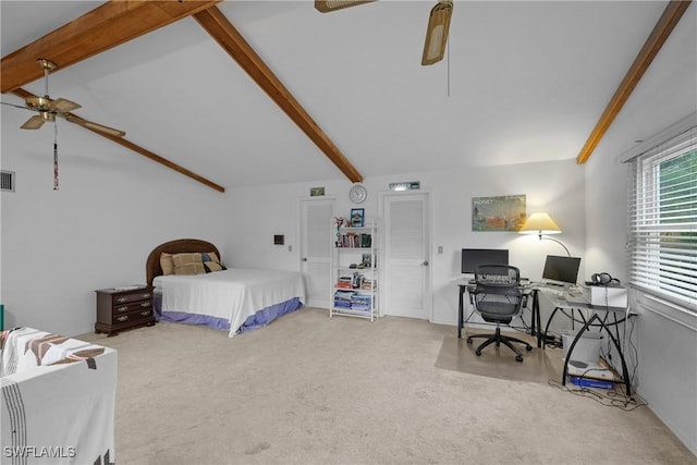 carpeted bedroom with ceiling fan and vaulted ceiling with beams