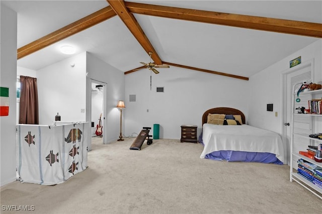 bedroom with ceiling fan, carpet floors, and lofted ceiling with beams