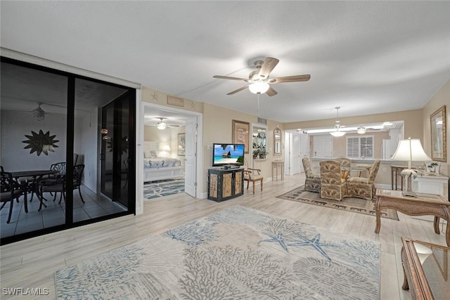 living room with ceiling fan