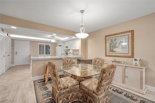 dining room featuring light hardwood / wood-style flooring