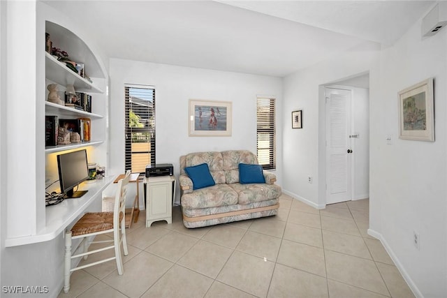 sitting room featuring light tile patterned floors