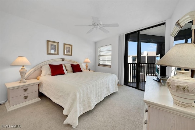 carpeted bedroom with ceiling fan and access to exterior