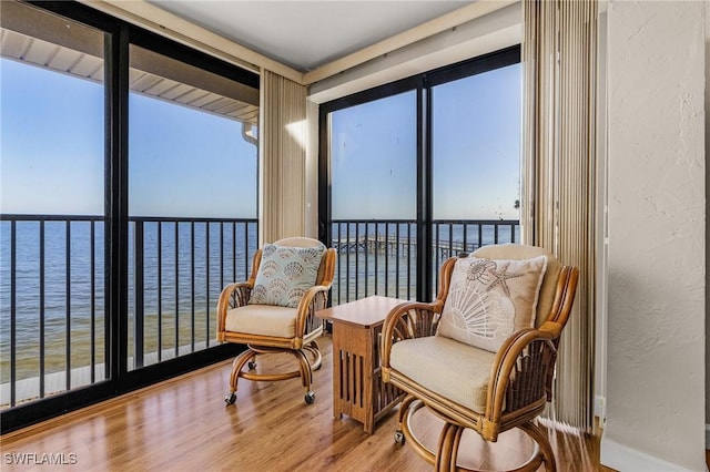 sunroom with a water view