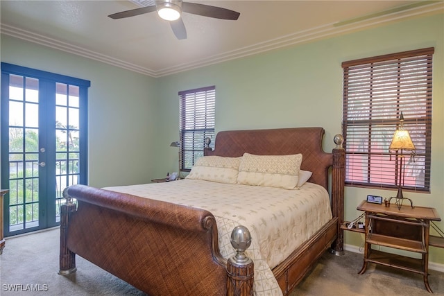 bedroom with ceiling fan, carpet, access to exterior, multiple windows, and french doors