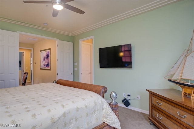 bedroom with ceiling fan and light carpet