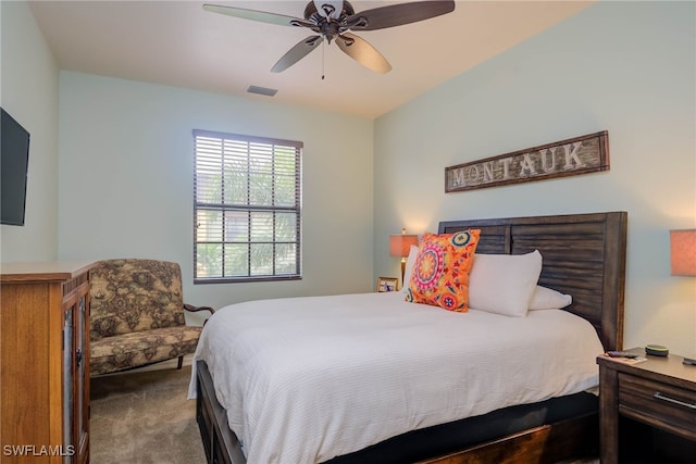 carpeted bedroom with ceiling fan