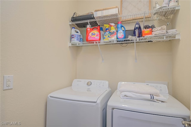 laundry area featuring washer and clothes dryer