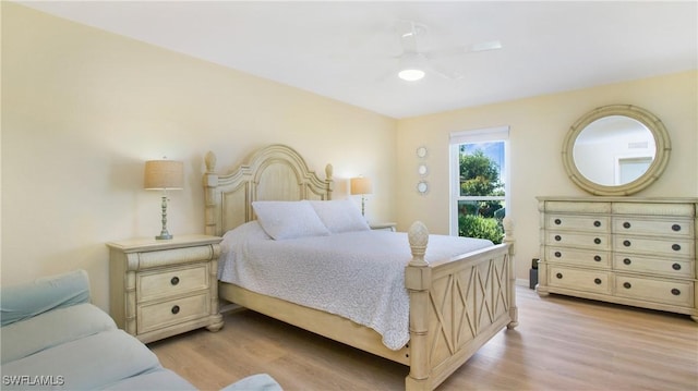 bedroom featuring ceiling fan and light hardwood / wood-style flooring