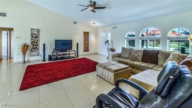 tiled living room with high vaulted ceiling and ceiling fan