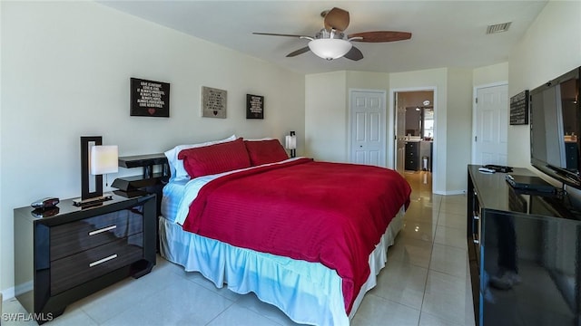 bedroom featuring ceiling fan and light tile patterned floors