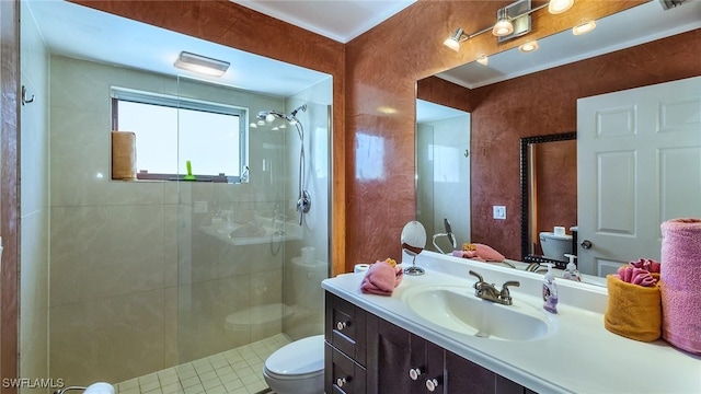 bathroom with toilet, walk in shower, and vanity