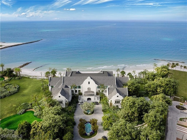 bird's eye view with a water view and a view of the beach