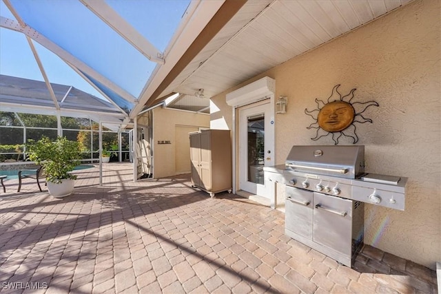 view of patio featuring an AC wall unit, a grill, and glass enclosure