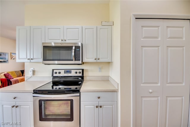 kitchen featuring white cabinets and stainless steel appliances