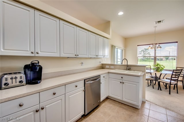 kitchen with dishwasher, white cabinetry, sink, hanging light fixtures, and kitchen peninsula