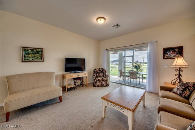 living room featuring carpet