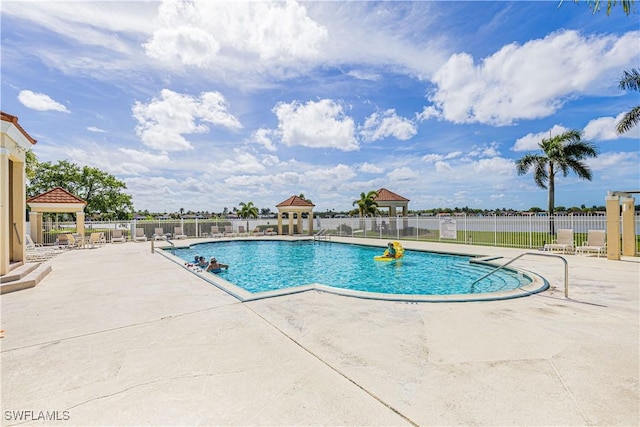 view of pool featuring a gazebo and a patio area