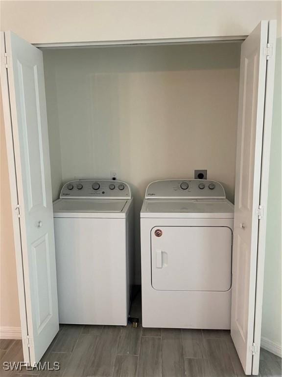 washroom featuring separate washer and dryer