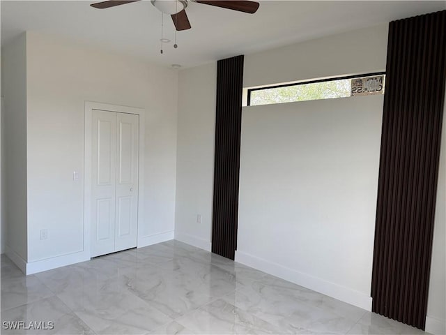 empty room with ceiling fan