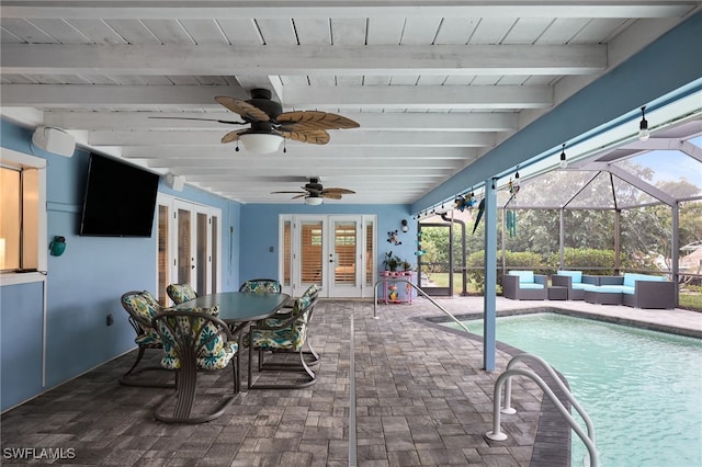 view of patio / terrace with an outdoor hangout area, ceiling fan, a lanai, and french doors