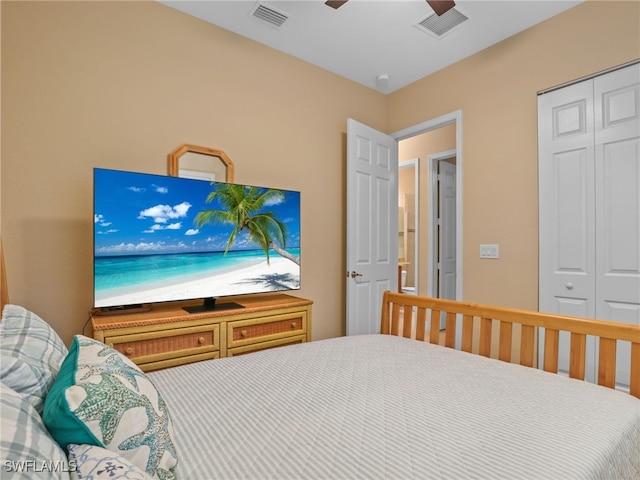 bedroom featuring ceiling fan and a closet