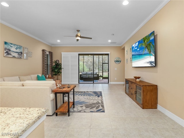 tiled living room with ceiling fan and crown molding