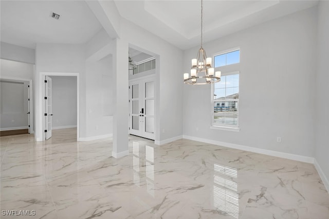 unfurnished dining area with marble finish floor, visible vents, and baseboards