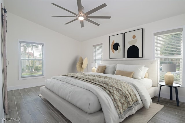 bedroom with vaulted ceiling and ceiling fan