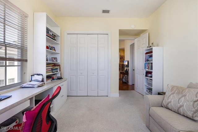 office space with light carpet