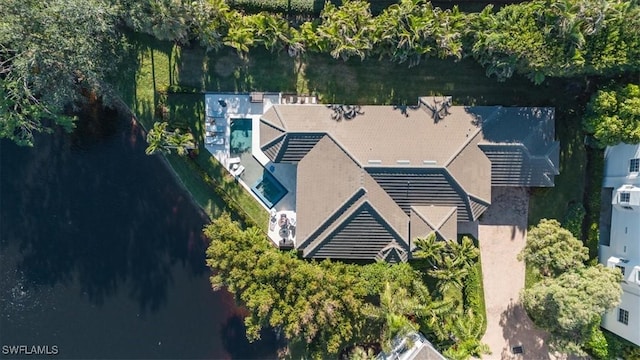 birds eye view of property featuring a water view