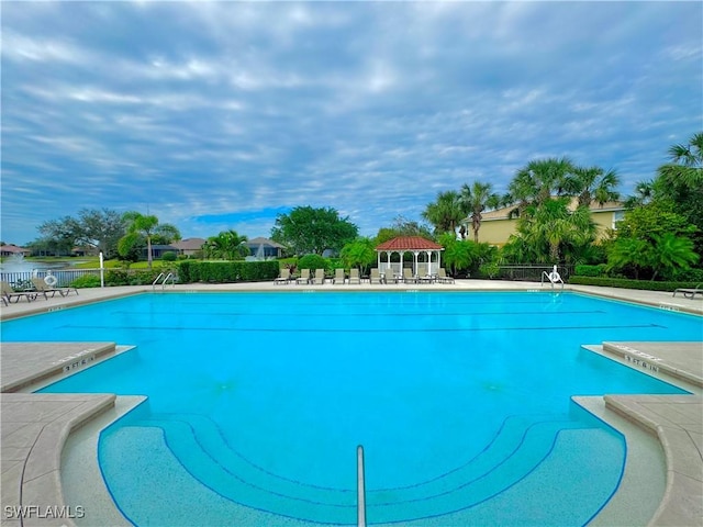 view of swimming pool with a gazebo