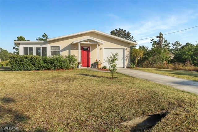 ranch-style house with a garage and a front lawn