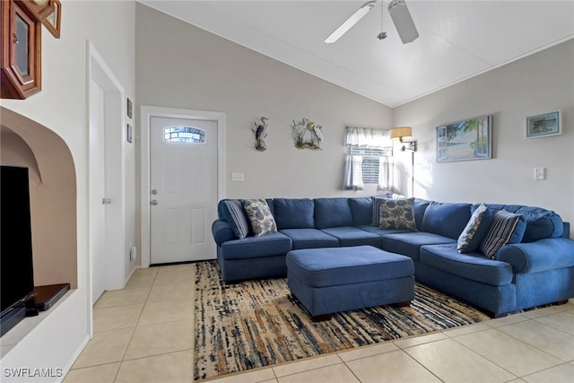 tiled living room with vaulted ceiling and ceiling fan