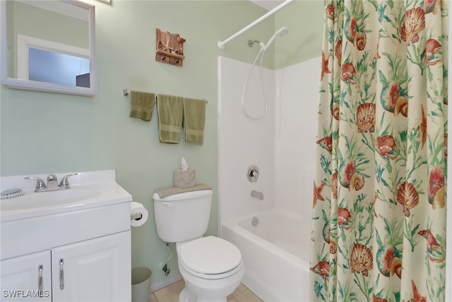 full bathroom featuring tile patterned floors, toilet, vanity, and shower / bath combo