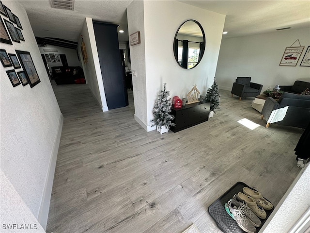 hallway featuring wood-type flooring