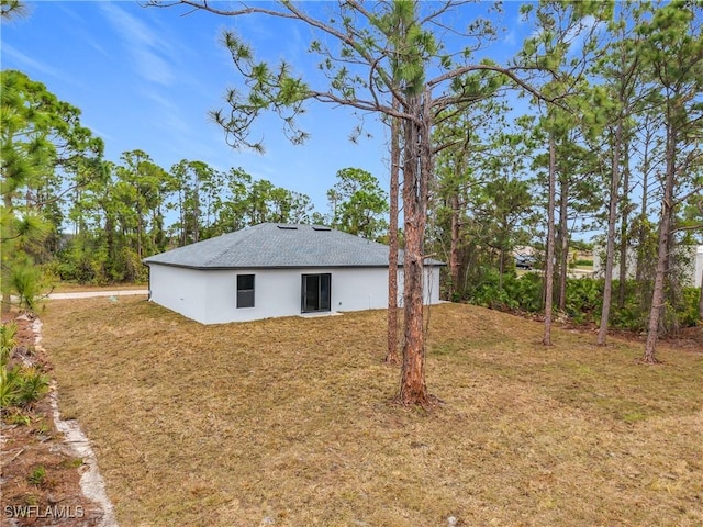 exterior space with a yard