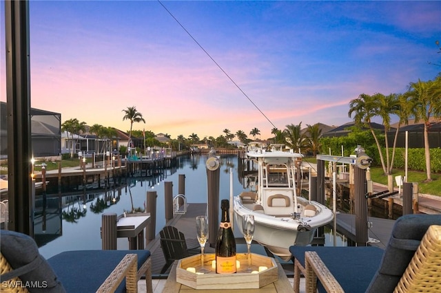 dock area with a water view