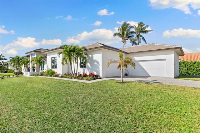 100 Templewood Ct, Marco Island, FL 34145 - view of front of house with a garage, driveway, a front lawn, and stucco siding
