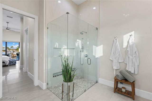 100 Templewood Ct, Marco Island, FL 34145 - ensuite bathroom featuring a shower stall, baseboards, and ceiling fan