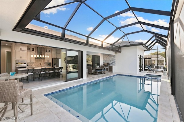 100 Templewood Ct, Marco Island, FL 34145 - outdoor pool with a patio area and a lanai