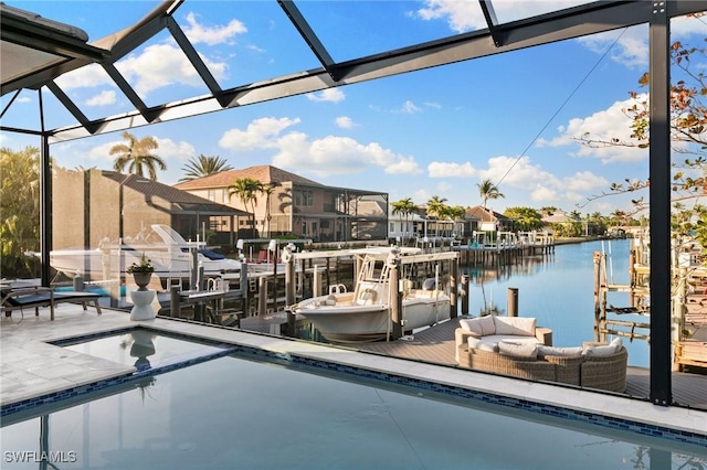 view of pool with a water view, a boat dock, and glass enclosure