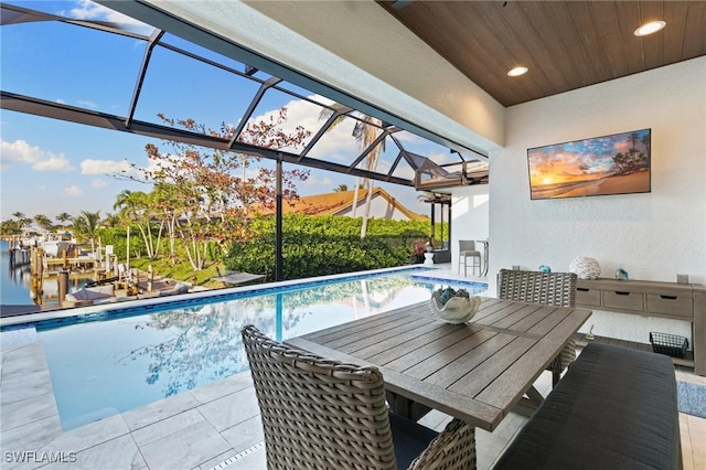 100 Templewood Ct, Marco Island, FL 34145 - view of patio with an outdoor pool and glass enclosure