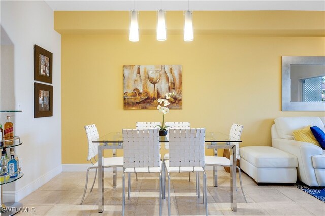 dining area with tile patterned floors