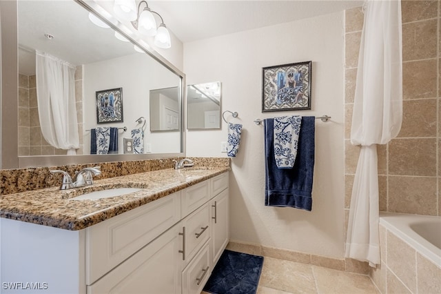 bathroom featuring tile patterned floors, vanity, and shower / tub combo