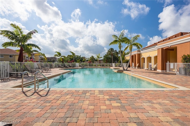 view of swimming pool featuring a patio